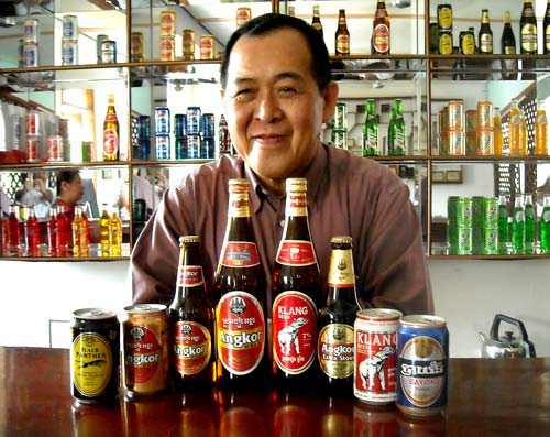 lim's smiling because he makes angkor beer 7 days a week in sihanoukville, cambodia.